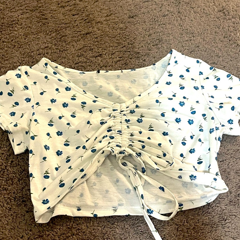 White floral crop too